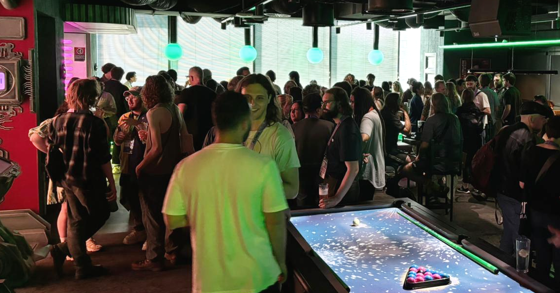 Filmmakers mingling at a networking event